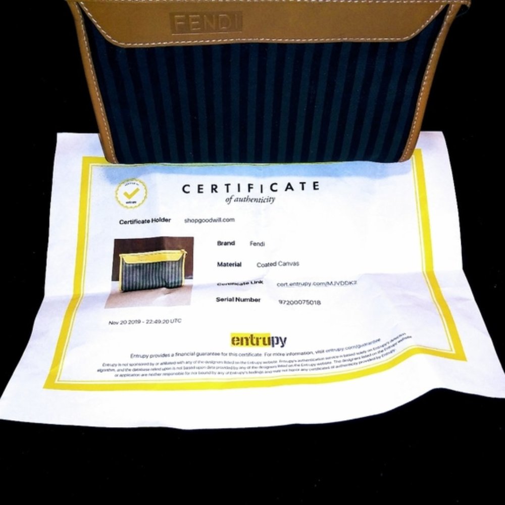 FENDI clutch/ handbag.